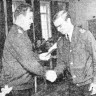Марголин Я. Н. начальник морской школы вручает аттестат  об окончании курсанту-отличнику Оэсельг А. 16 ноября 1971