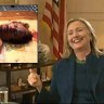 эта бешенная  пиндоская  гиена  - Хиллари  Клинтон - радуется  убийству  Каддафи