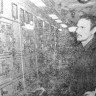 Просеков Виктор 3-й электромеханик внимательно следит  за  показаниями  приборов на электрощите -  ПБ  Станислав Монюшко 19 08 1976